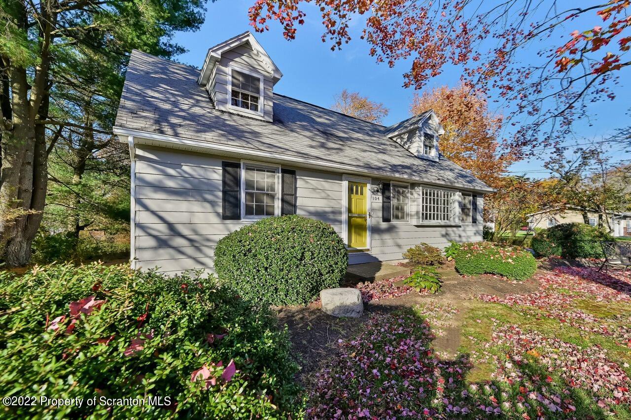 104 Fern Lane Moscow, PA 18444 - Photo 42 of 44 a front view of a house with garden