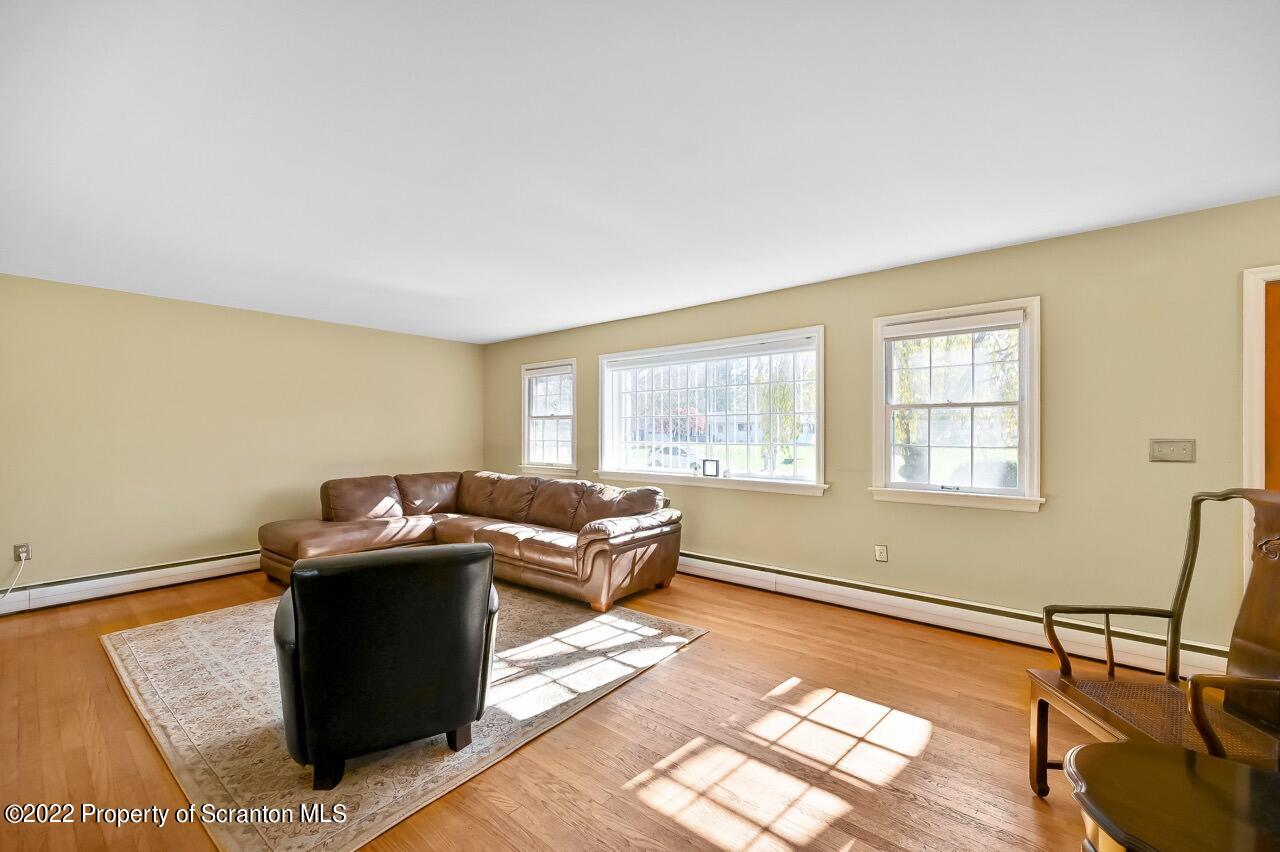 104 Fern Lane Moscow, PA 18444 - Photo 5 of 44 a bed room with furniture and a window