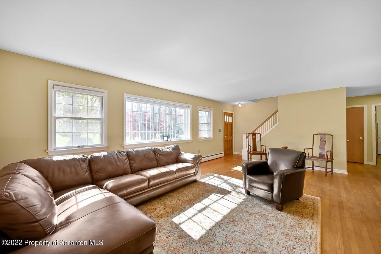 104 Fern Lane Moscow, PA 18444 - Photo 6 of 44 a living room with furniture and a window