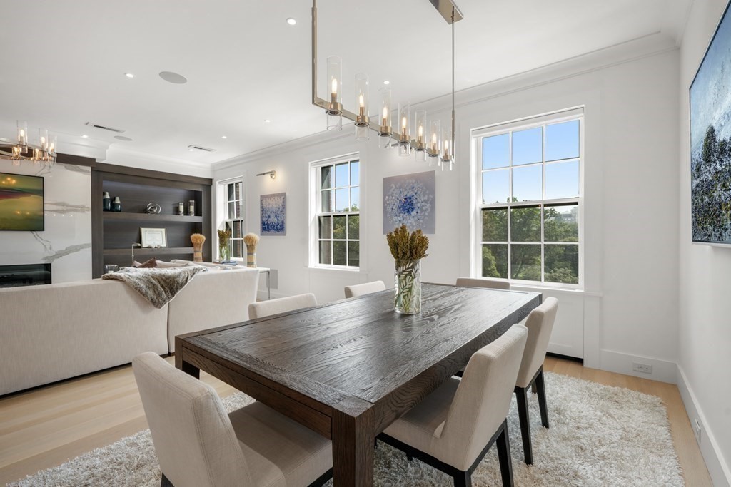 94 Beacon Street, Unit 4 Boston, MA 02108 - Photo 16 of 35 a view of a dining room with furniture window and wooden floor