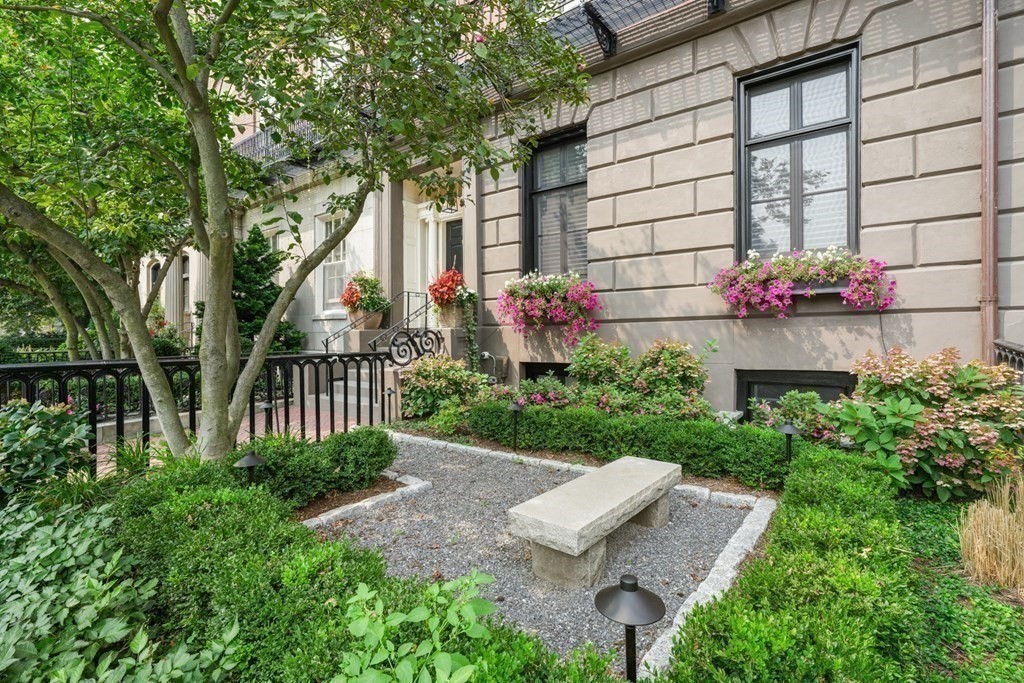 94 Beacon Street, Unit 4 Boston, MA 02108 - Photo 33 of 35 a view of a house with a yard and sitting area