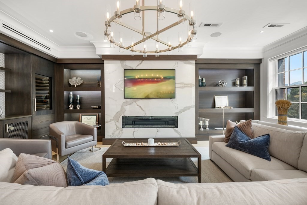 94 Beacon Street, Unit 4 Boston, MA 02108 - Photo 5 of 35 a living room with furniture and kitchen view