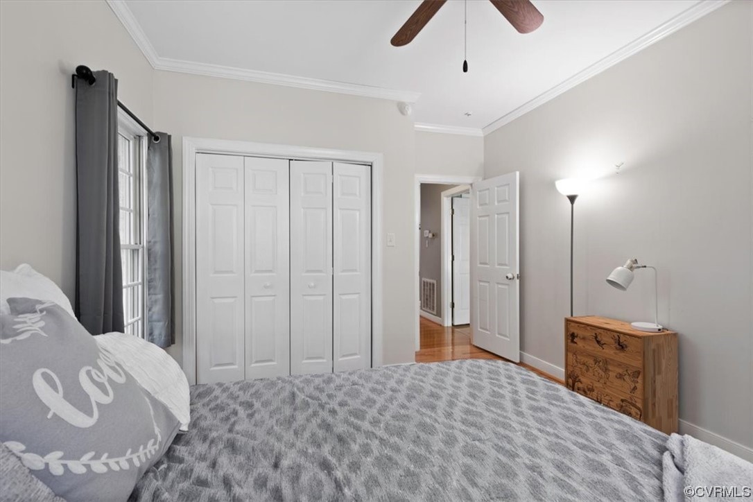 10600 Spring Run Road Chesterfield, VA 23832 - Photo 35 of 49 a bedroom with a large bed and a chandelier