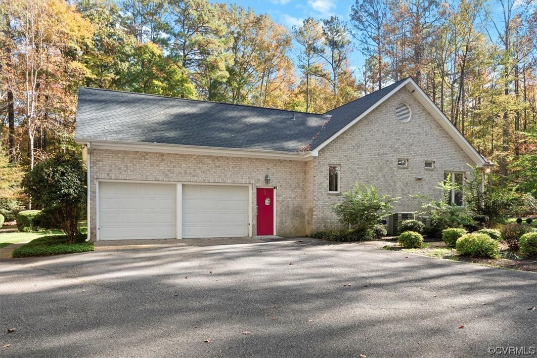 10600 Spring Run Road Chesterfield, VA 23832 - Photo 39 of 49 front view of a house with a street