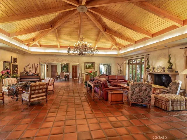 a view of a room with wooden floors