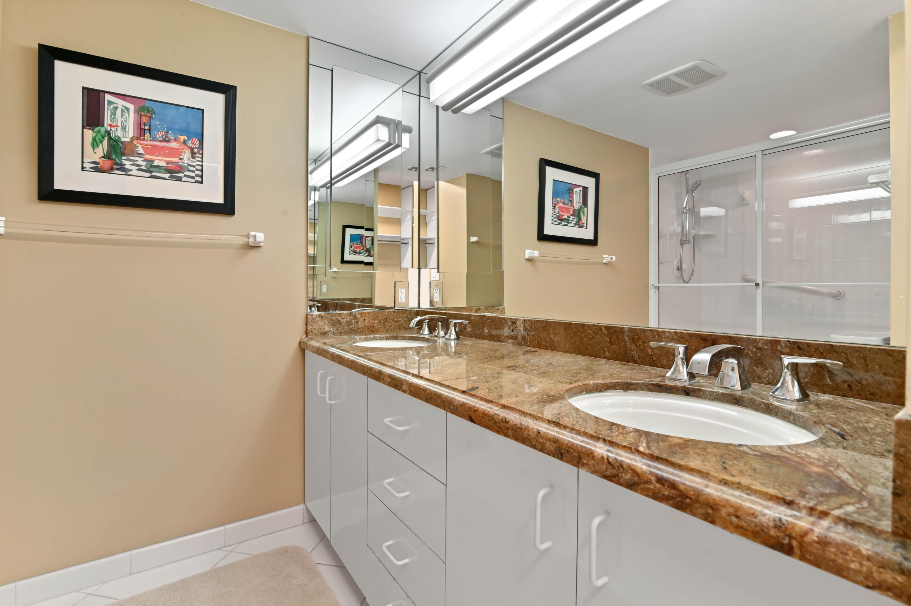 2800 South Ocean Boulevard, Unit 5J Boca Raton, FL 33432 - Photo 19 of 56 a bathroom with a granite countertop sink mirror and a