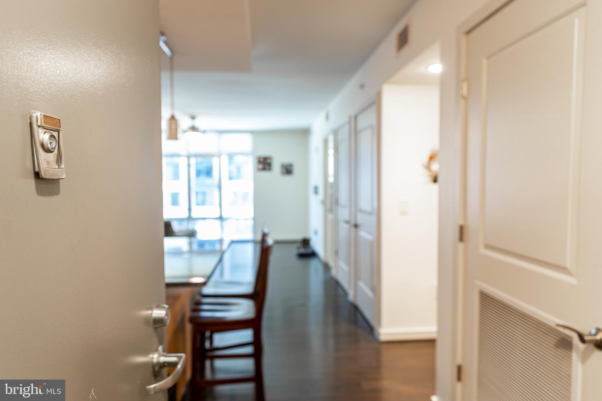 1025 First Street Southeast, Unit 514 Washington, DC 20003 - Photo 13 of 15 a view of a hallway with furniture and windows