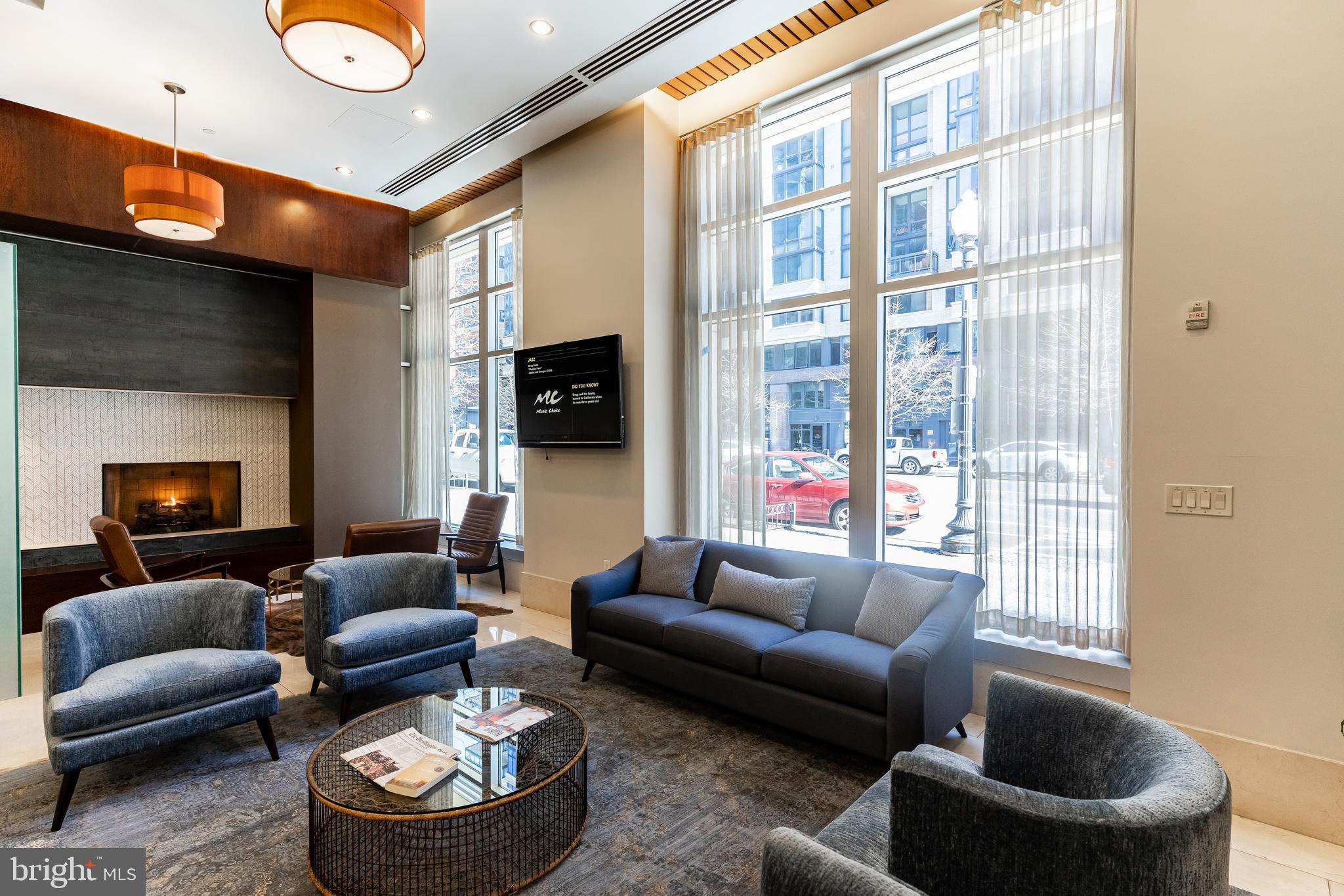 1025 First Street Southeast, Unit 514 Washington, DC 20003 - Photo 15 of 15 a living room with furniture and a flat screen tv
