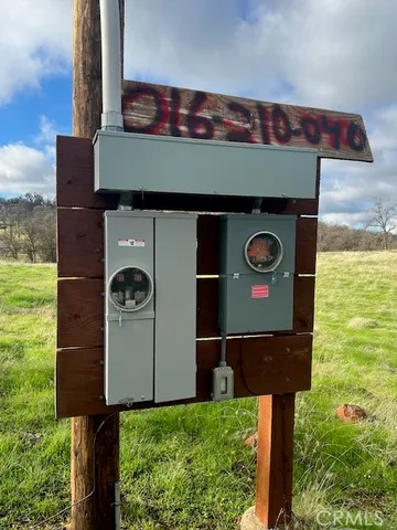 a front view of a house with parking area