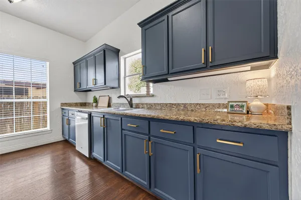 a view of a building with sitting area