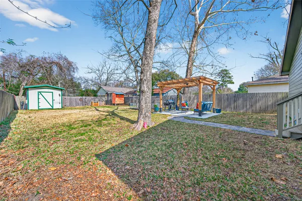 a bedroom with a bed and furniture