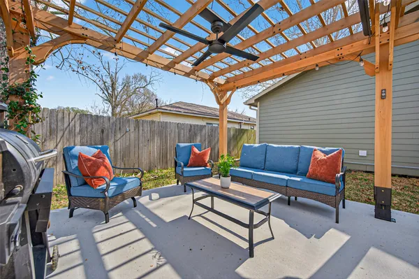 a bathroom with a double vanity sink a mirror a shower and a bathtub