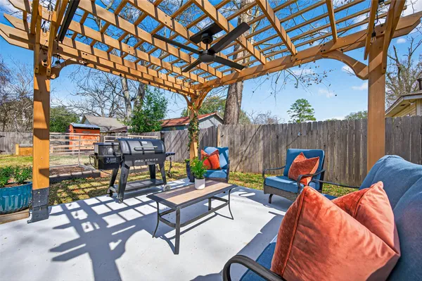 a bathroom with a sink a shower and a mirror