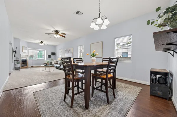 a kitchen with stainless steel appliances granite countertop wooden cabinets a stove top oven a sink and dishwasher