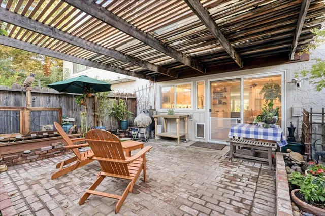 a patio with patio lots of furniture and outdoor seating