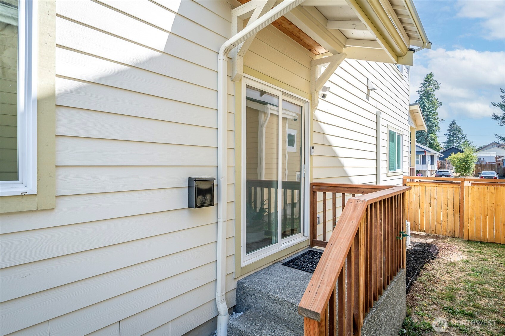 3506 South Tyler Street Tacoma, WA 98409 - Photo 15 of 32 a view of balcony with wooden floor and fence