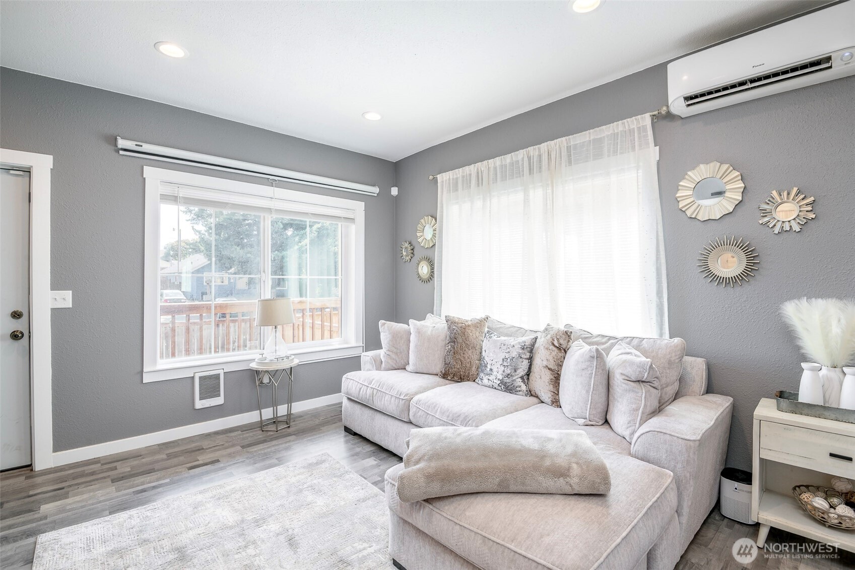 3506 South Tyler Street Tacoma, WA 98409 - Photo 23 of 32 a living room with furniture and a large window