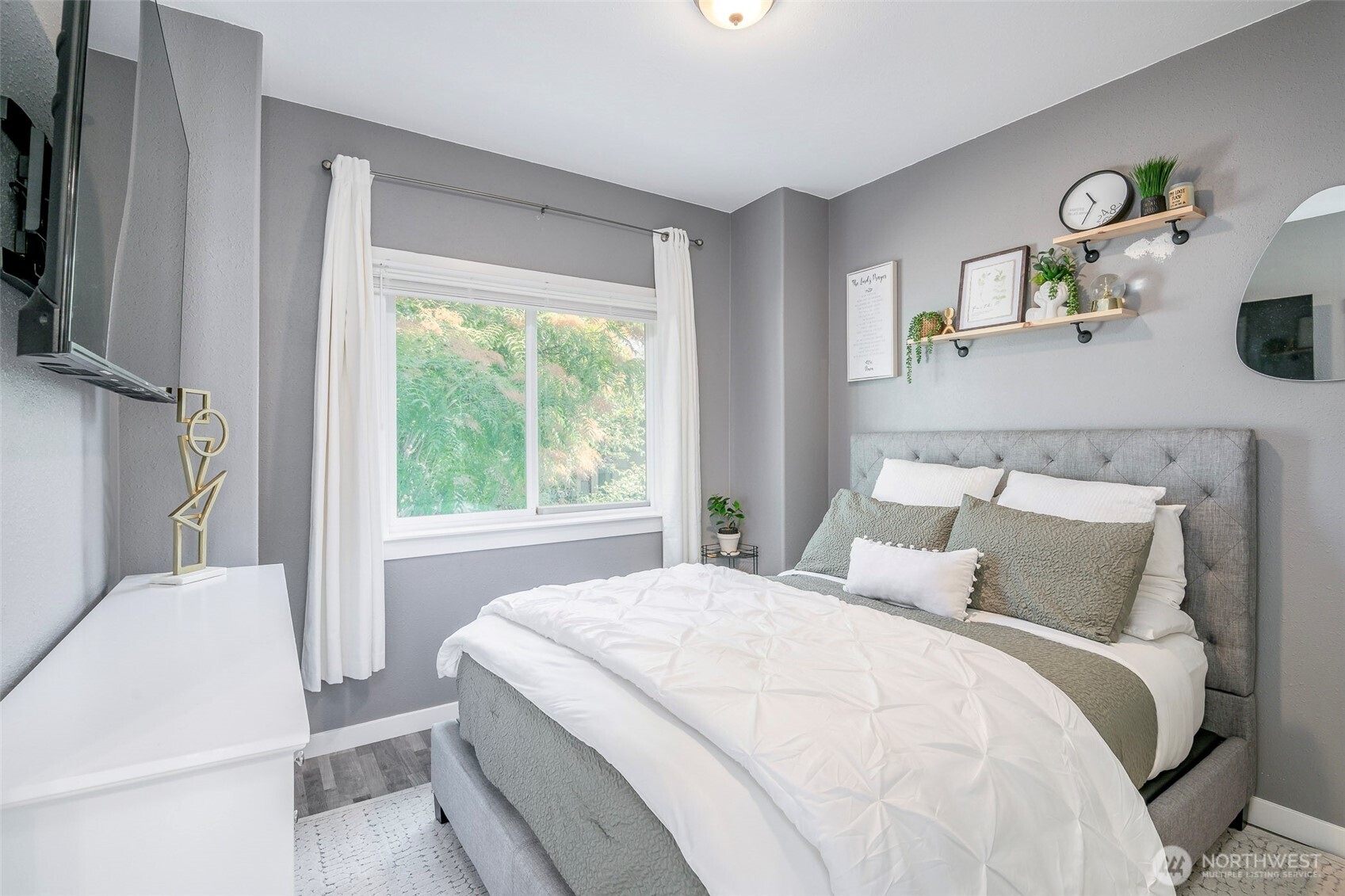 3506 South Tyler Street Tacoma, WA 98409 - Photo 24 of 32 a bedroom with a bed and a window