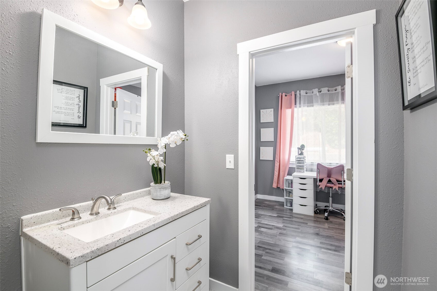 3506 South Tyler Street Tacoma, WA 98409 - Photo 26 of 32 a bathroom with a sink vanity and mirror