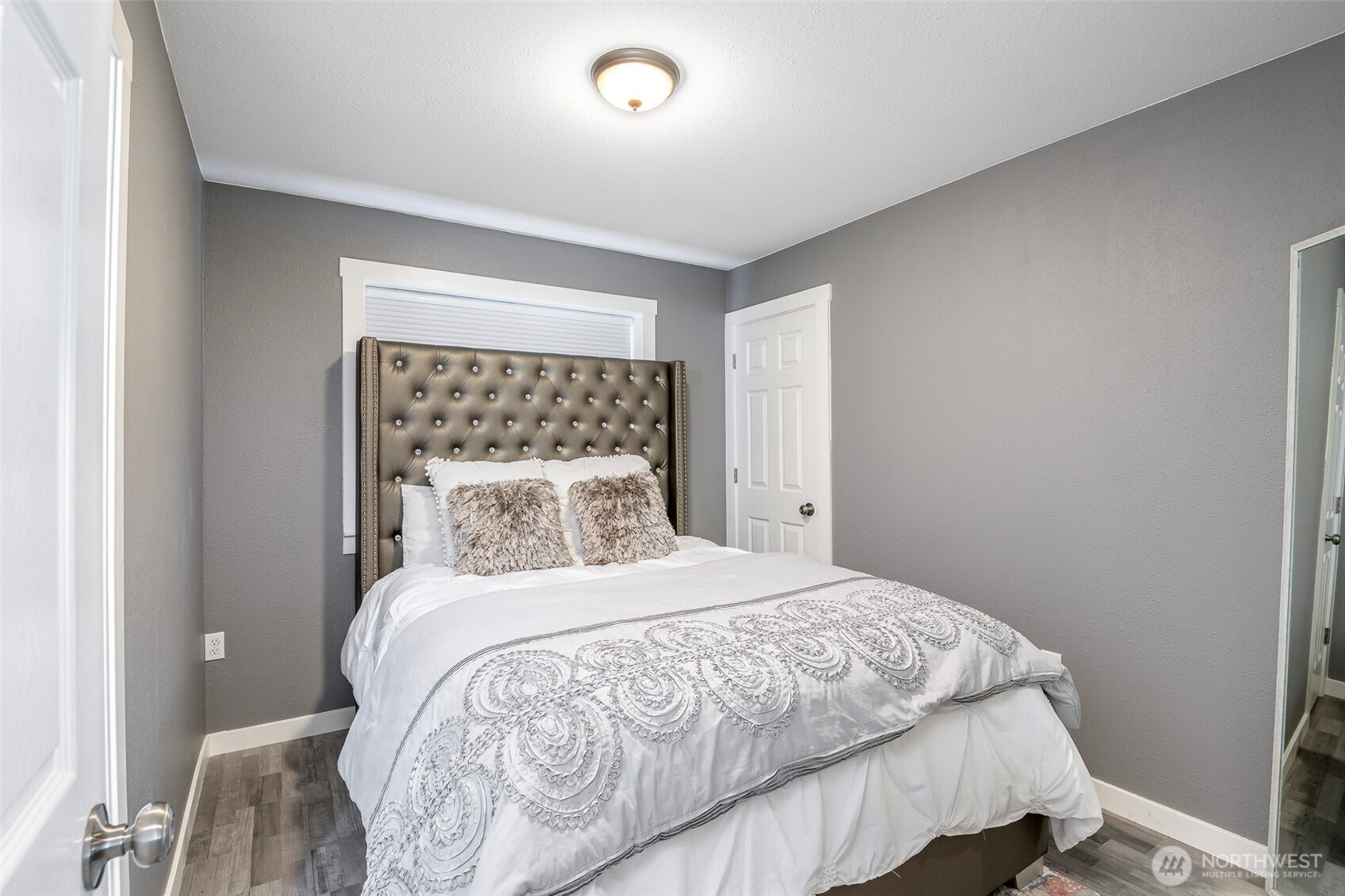 3506 South Tyler Street Tacoma, WA 98409 - Photo 7 of 32 a bedroom with a bed and a window