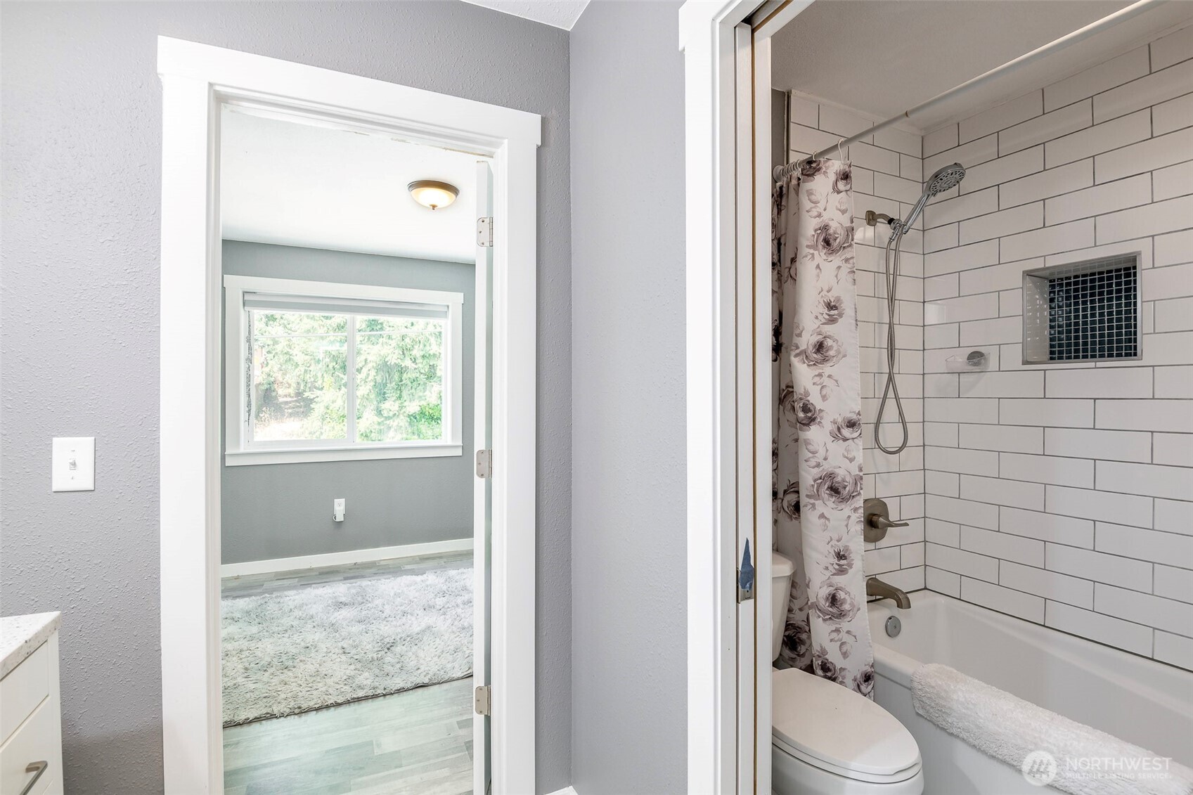 3506 South Tyler Street Tacoma, WA 98409 - Photo 9 of 32 a bathroom with a toilet a sink and a shower