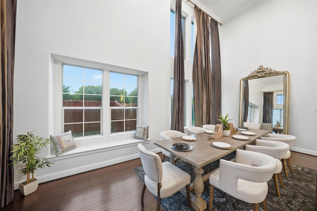 624 Sorrell Road McKinney, TX 75072 - Photo 4 of 28 a dining room with furniture and wooden floor