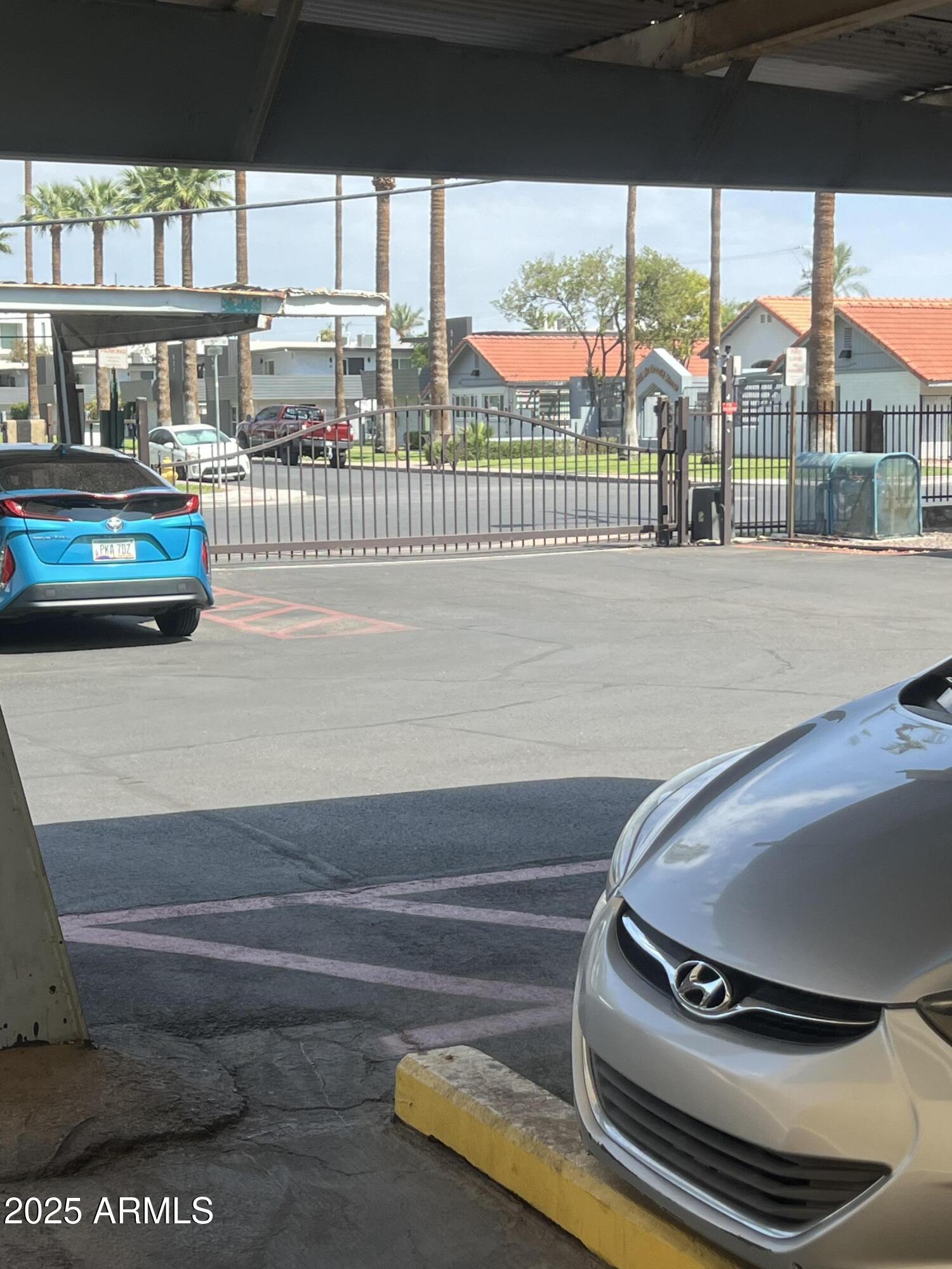 353 East Thomas Road, Unit C104 Phoenix, AZ 85012 - Photo 17 of 17 a picture of a living room with a floor