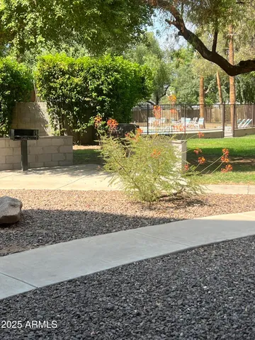 a view of a yard with an outdoor space