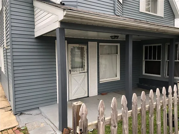a front view of a house with a garage