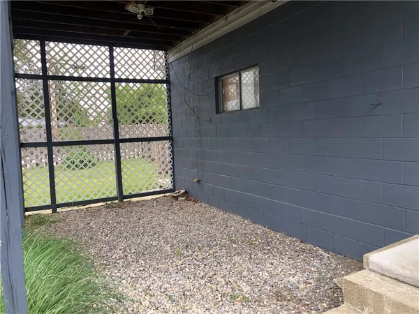 a view of a room with a window
