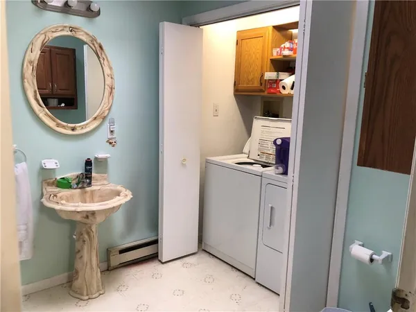 a bathroom with a sink and a mirror
