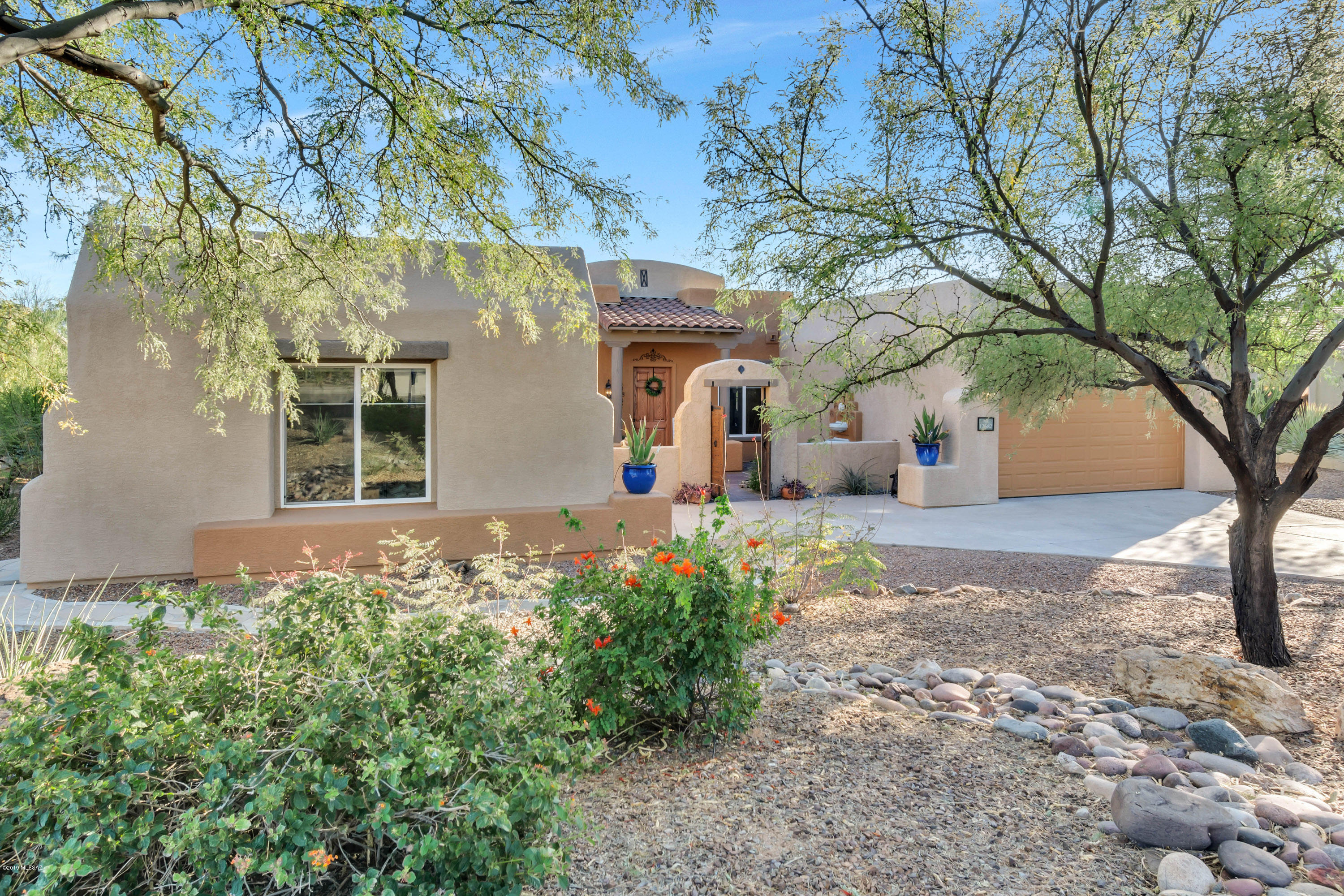 12682 North Spirit Mountain Road Oro Valley, AZ 85755 - Photo 1 of 40 a front view of house with yard