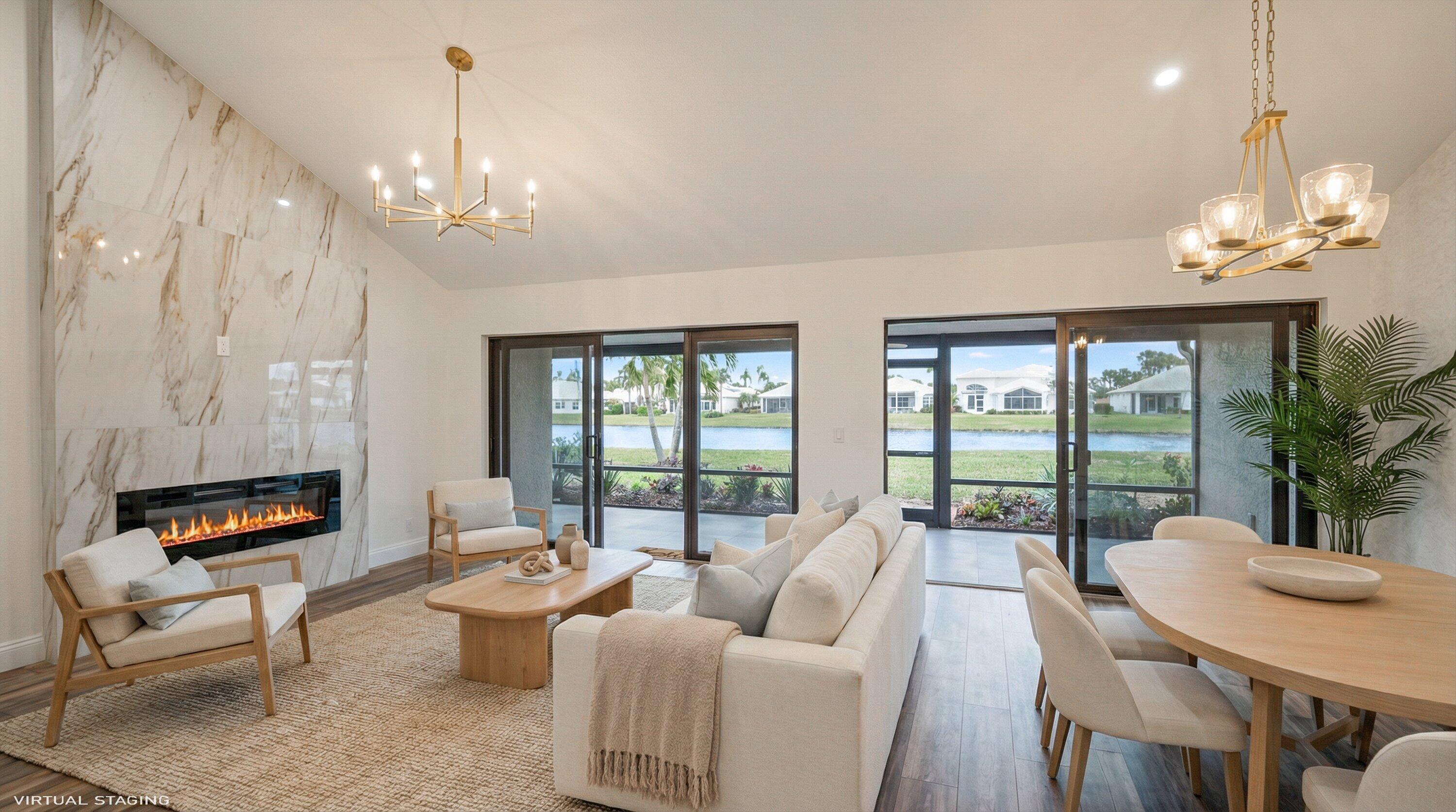 3733 Cape Pointe Circle Jupiter, FL 33477 - Photo 30 of 63 a view of a livingroom with furniture window and outside view