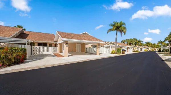 a kitchen with stainless steel appliances a sink stove and cabinets