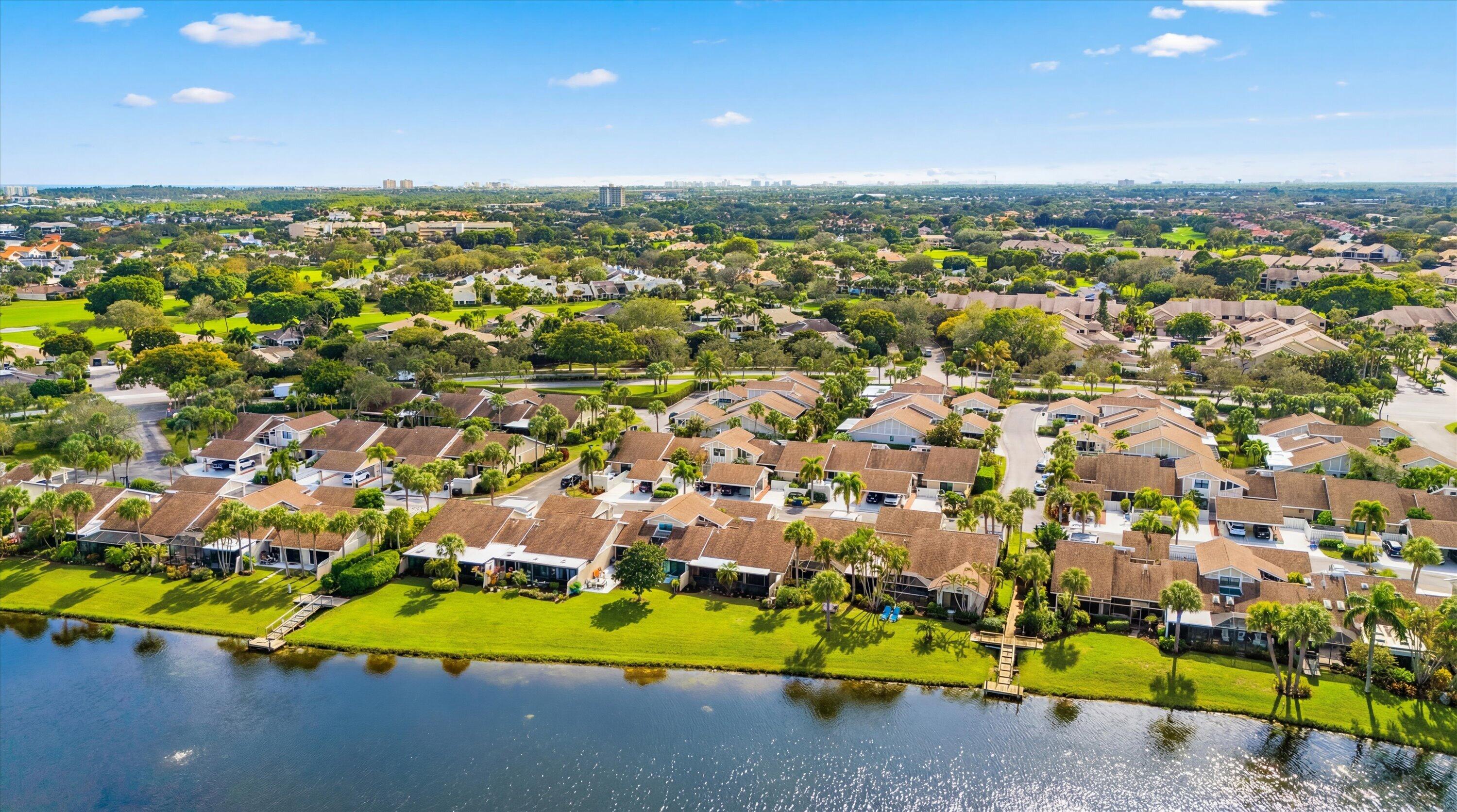 3733 Cape Pointe Circle Jupiter, FL 33477 - Photo 56 of 63 an aerial view of residential houses with outdoor space