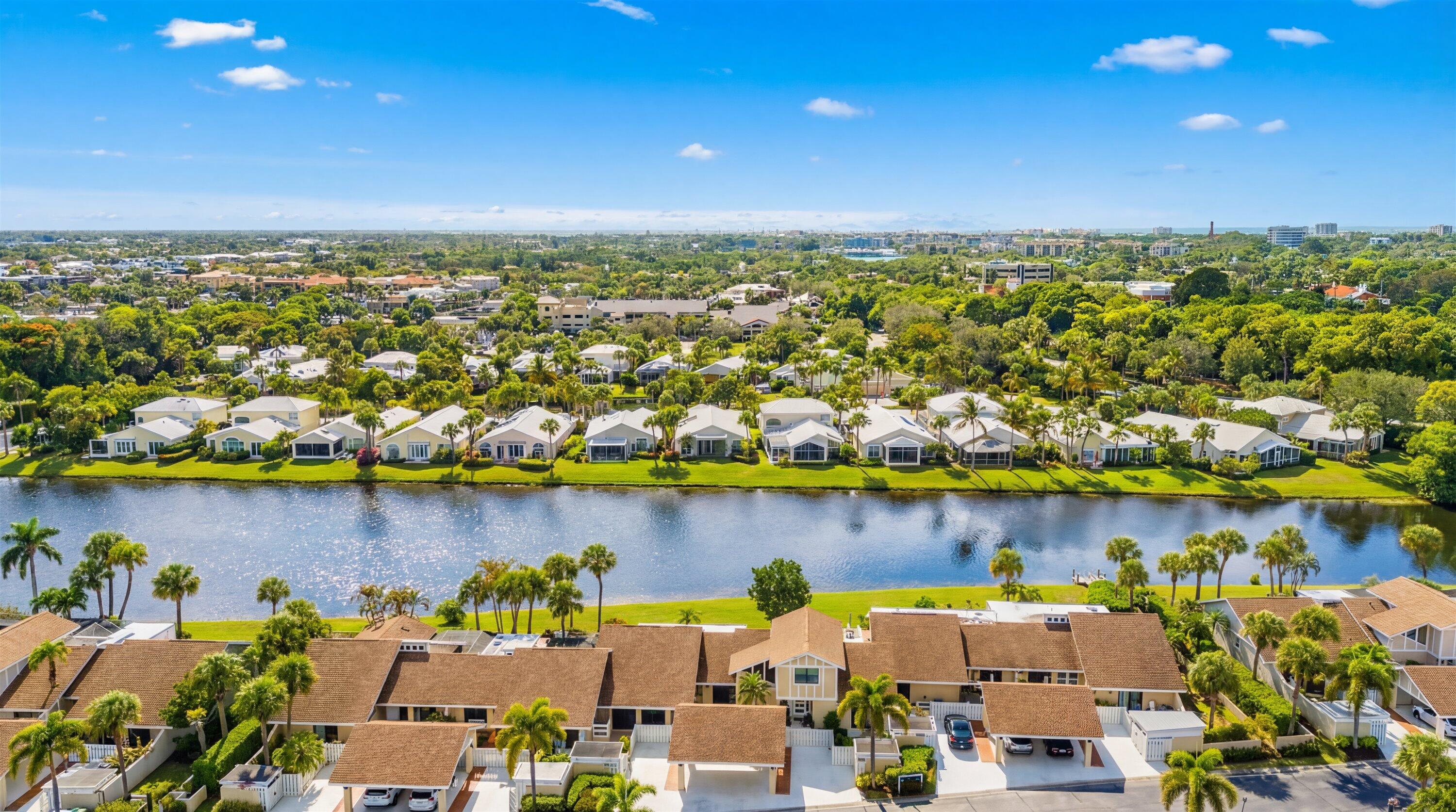 3733 Cape Pointe Circle Jupiter, FL 33477 - Photo 63 of 63 an aerial view of a city with houses