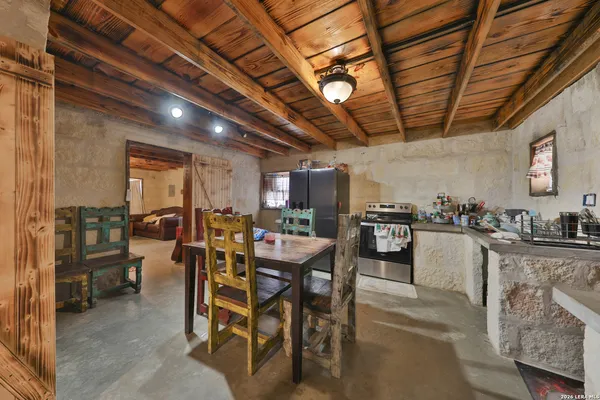 a view of a dining room with furniture