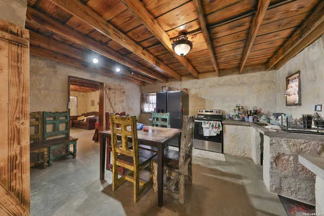 a view of a dining room with furniture