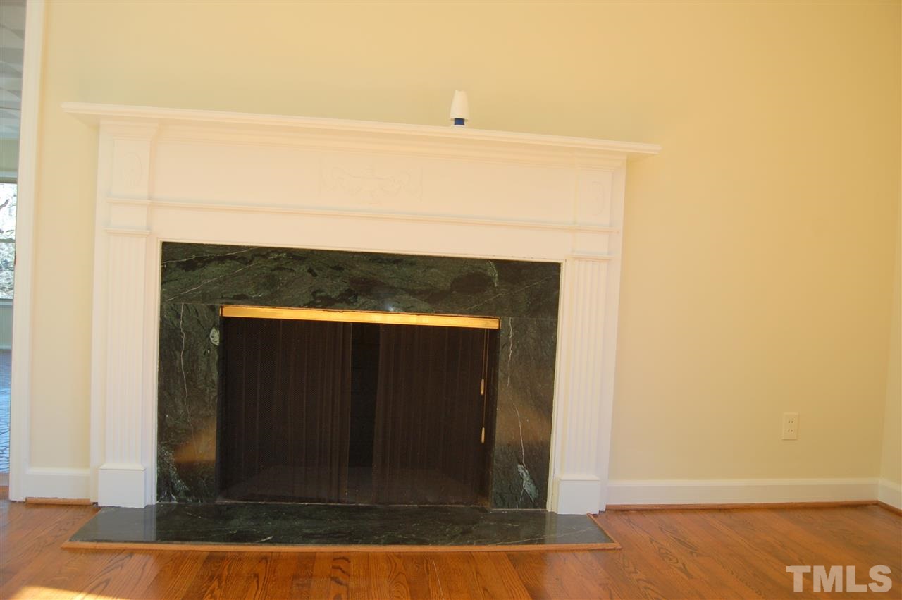 409 Goodwin Road Durham, NC 27712 - Photo 5 of 25 a living room with a fireplace