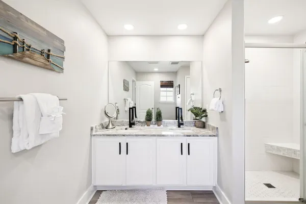 a bathroom with a sink and a mirror