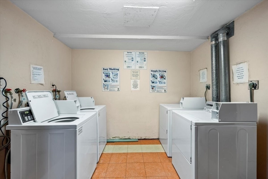 20 Erick Road, Unit 18 Mansfield, MA 02048 - Photo 16 of 21 a room with storage and utility