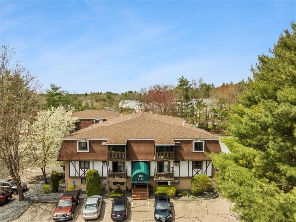 20 Erick Road, Unit 18 Mansfield, MA 02048 - Photo 18 of 21 a view of a house with roof deck front of house
