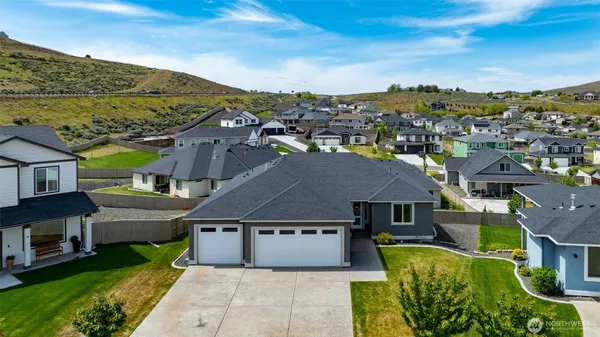 a aerial view of a house with a big yard