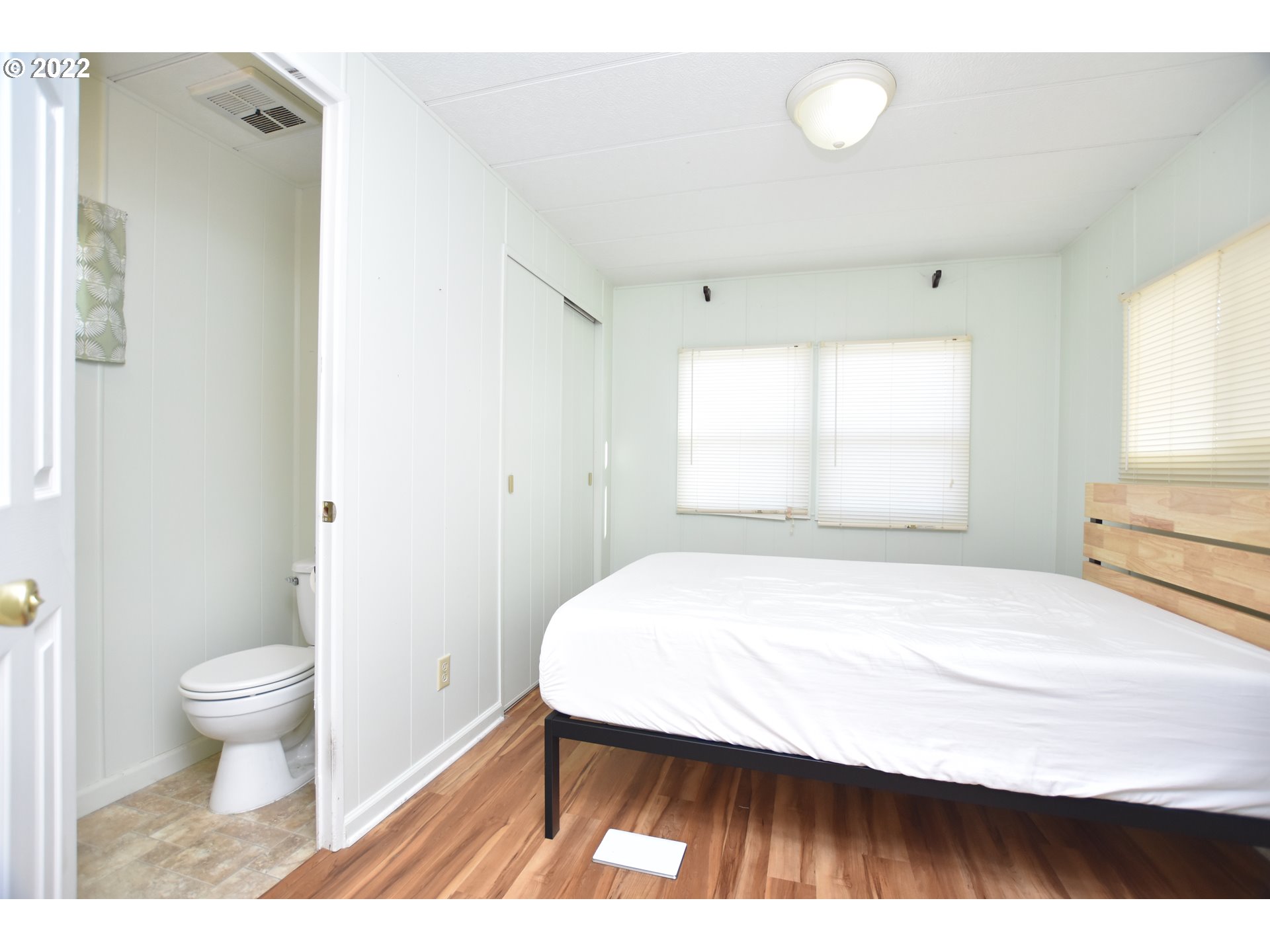 2150 Laura Street, Unit 26 Springfield, OR 97477 - Photo 9 of 26 a room with a bed and a window