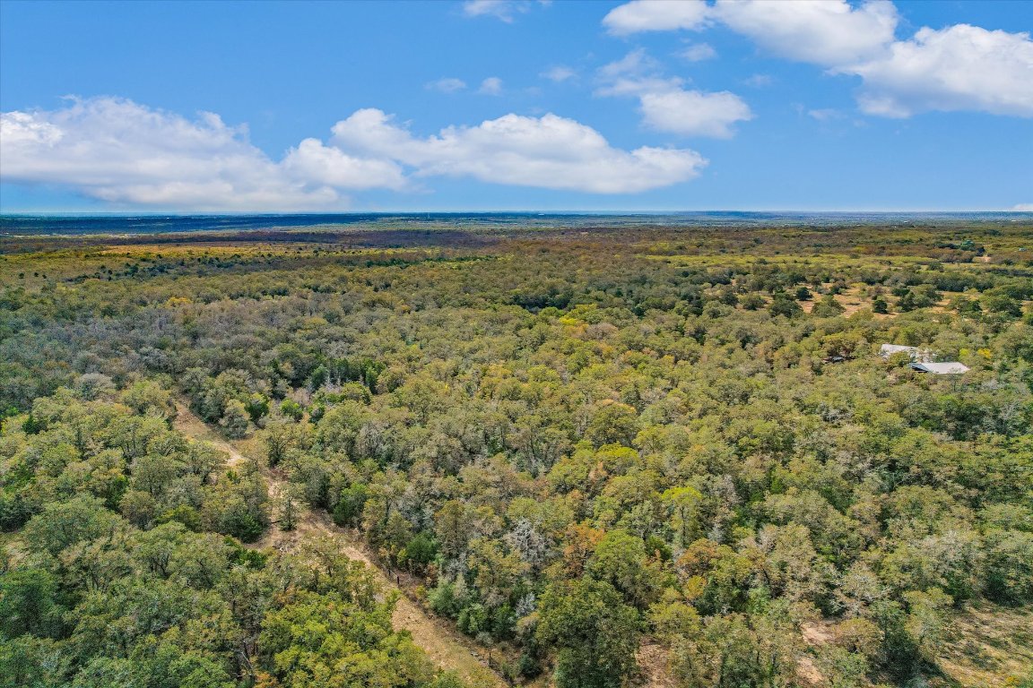 Tbd Porter Lane Lockhart, TX 78644 - Photo 4 of 10 a view of a field with an ocean