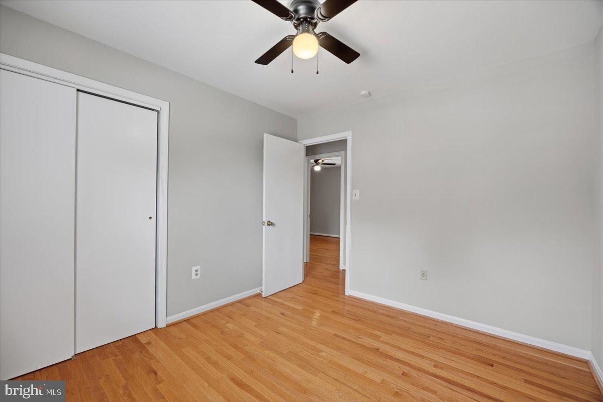 11603 Butlers Branch Road Clinton, MD 20735 - Photo 14 of 30 Bright and airy room with hardwood floors.