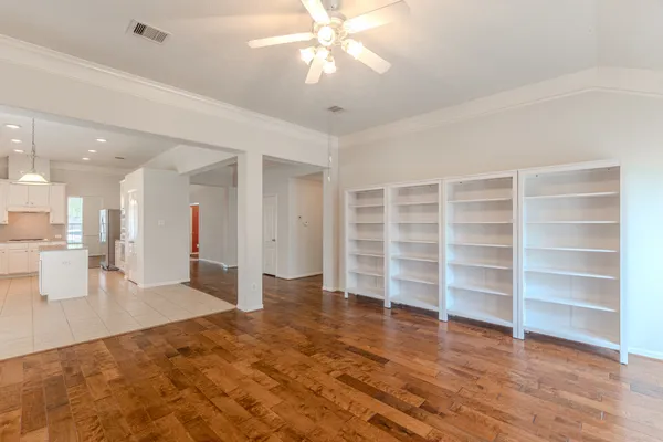 a view of a bathroom from a hallway