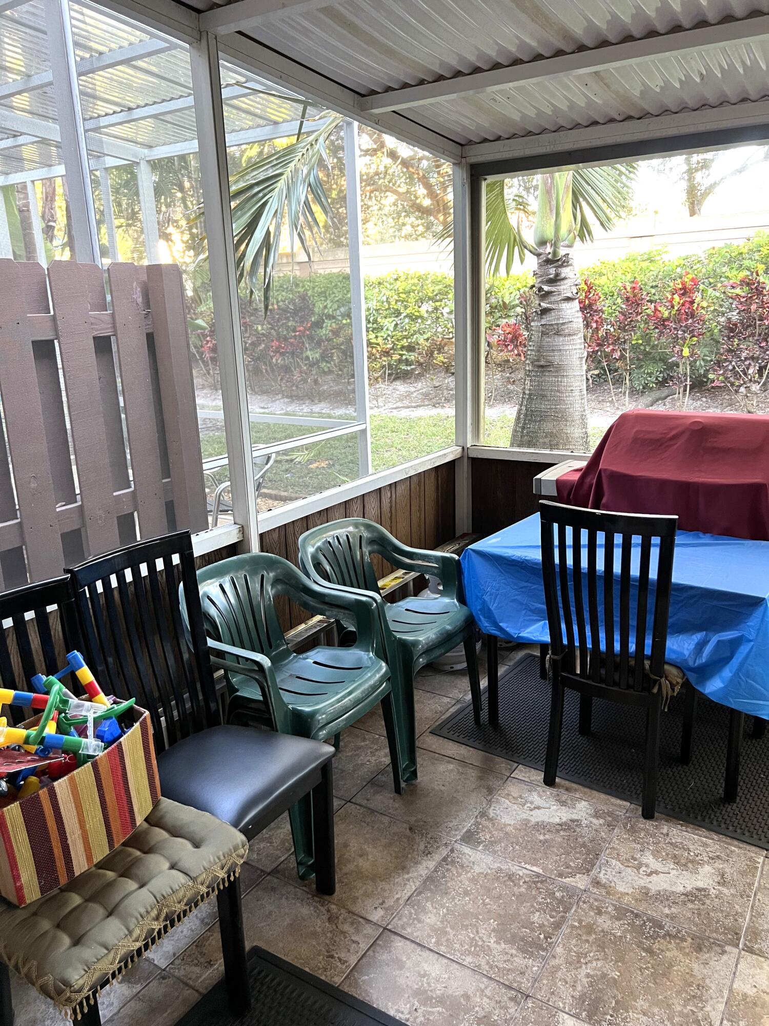 9416 Boca River Circle, Unit 9416 Boca Raton, FL 33434 - Photo 21 of 34 a living room with furniture and a large window