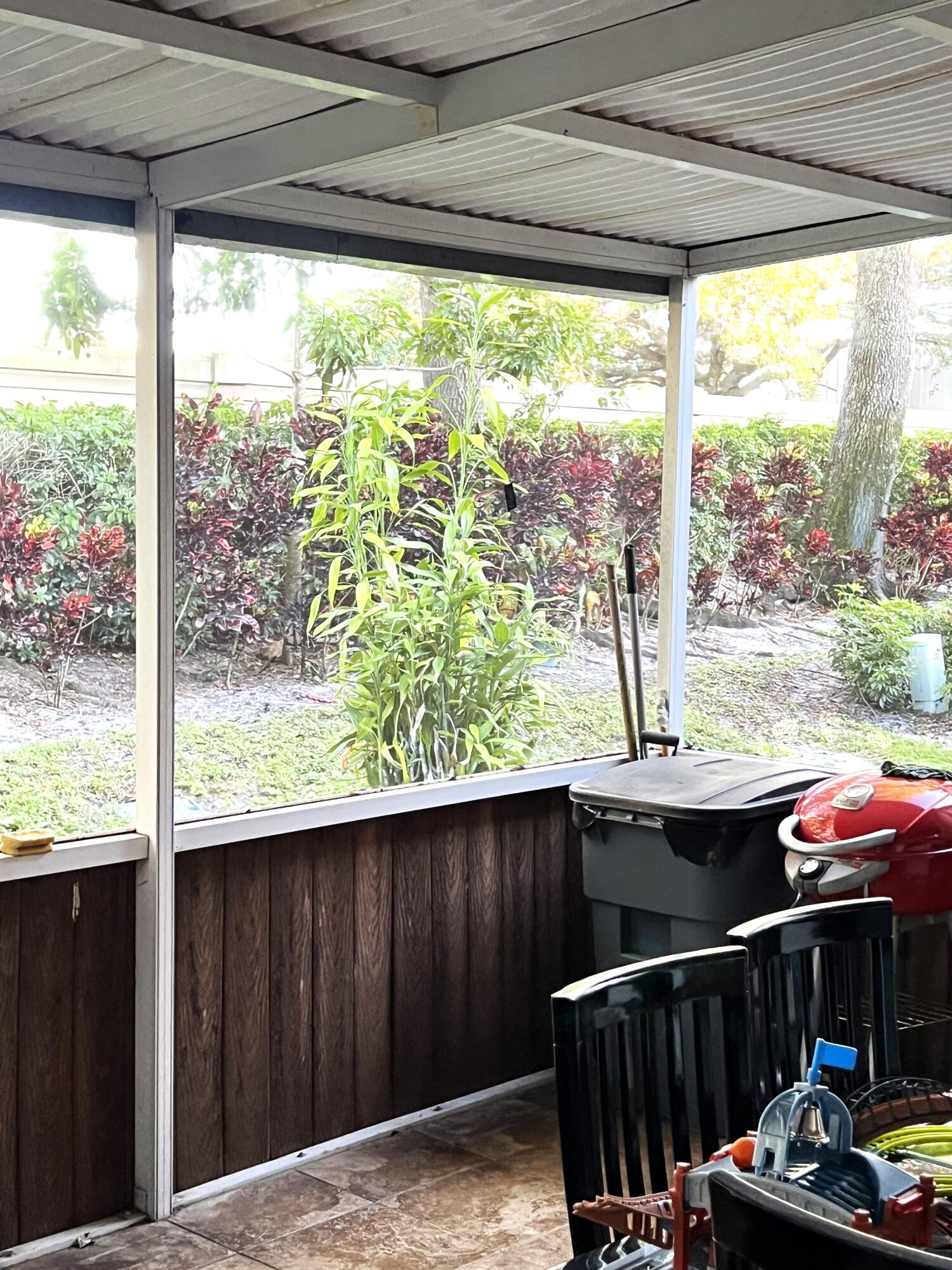 9416 Boca River Circle, Unit 9416 Boca Raton, FL 33434 - Photo 23 of 34 a balcony view with a couple of people