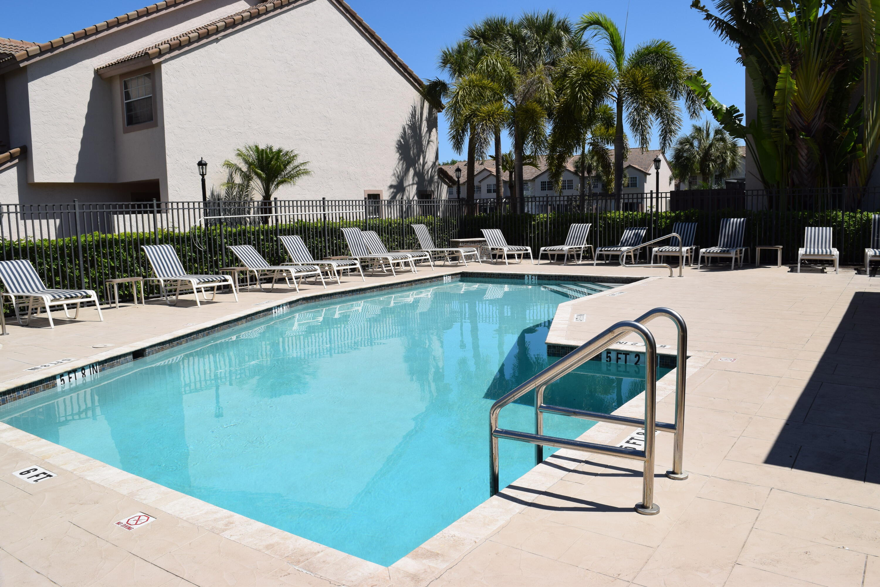9416 Boca River Circle, Unit 9416 Boca Raton, FL 33434 - Photo 30 of 34 a view of swimming pool with chairs